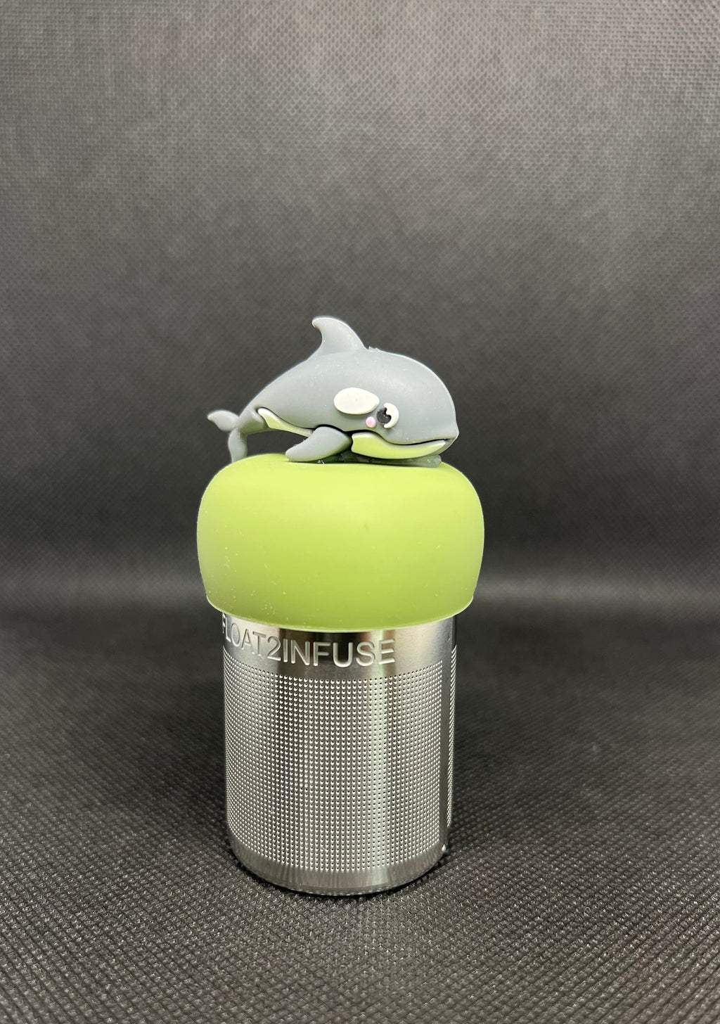 Dolphin floating tea steeper with green base