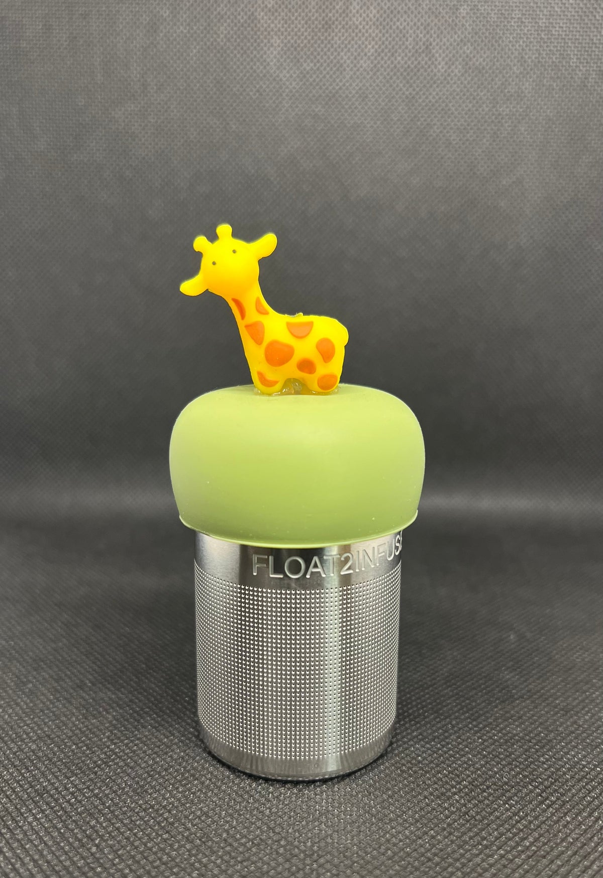 Giraffe floating tea steeper with green base