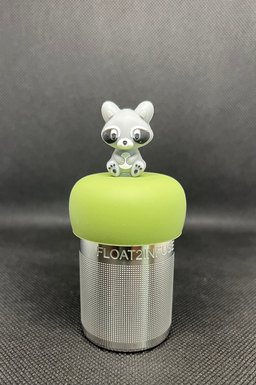 Raccoon floating tea steeper with green base